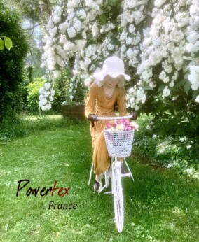 Girl on bike under philadelphus (1)